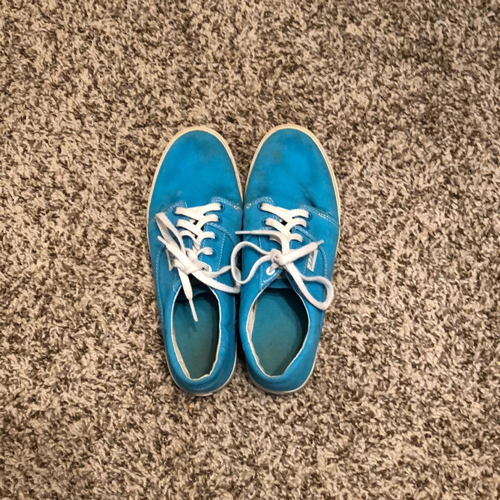 Blue tennis shoes.